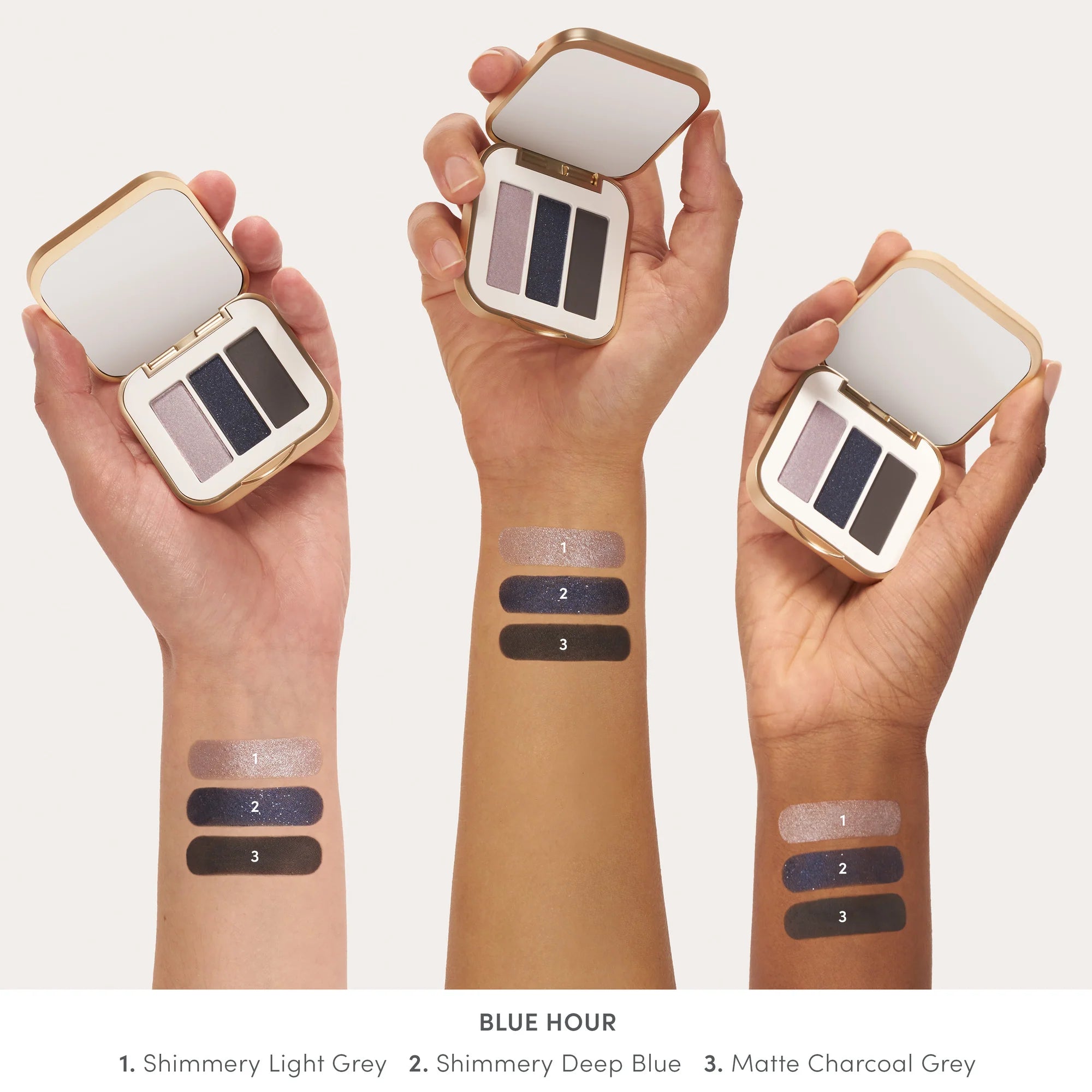 Jane Iredale's PurePressed® Eye Shadow Triple shade Blue Hour - shimmery light grey, shimmery deep blue, matte charcoal grey swatch. Jane Iredale Australian Stockist. Shop Now. Shipping in Australia only. Free Shipping for orders $350+.