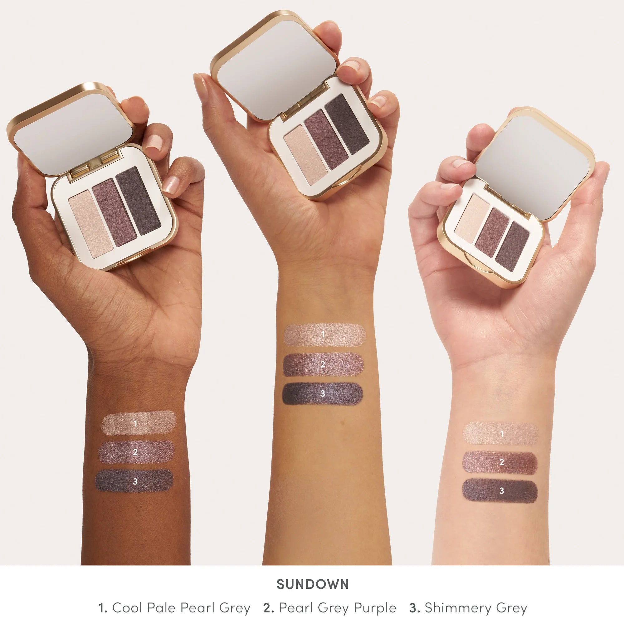 Jane Iredale's PurePressed® Eye Shadow Triple shade Sundown - pale pearl grey, pearl grey purple, shimmery grey swatch. Jane Iredale Australian Stockist. Shop Now. Shipping in Australia only. Free Shipping for orders $350+.