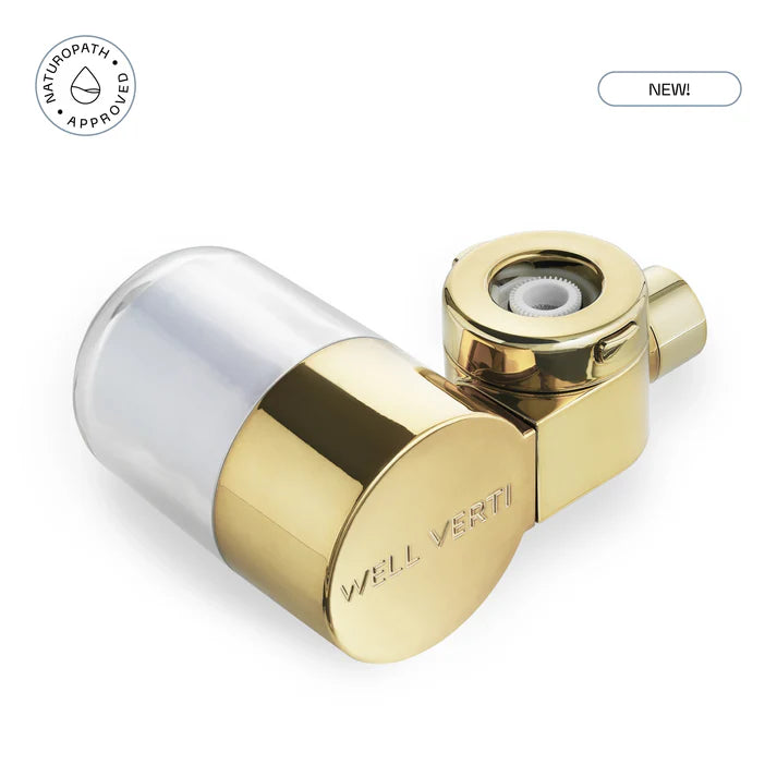 Gold and silver valve with 'Well Verti' branding on a white background. 'Naturopath Approved' and 'NEW!' labels. Ensure your water stays pure with the HaloDrop™ Tap Filter Refill. Quick-change cartridge designed to maintain elite filtration for skin and hair wellness. Monecious is a Well Verti Australian stockist. Shop now!
