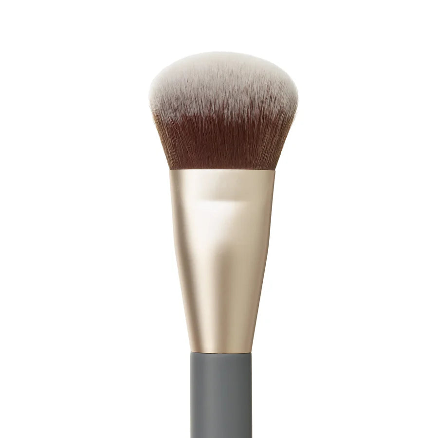 A versatile makeup blending brush designed for effortless application. Featuring a unique sloped shape and ultra-soft vegan fibres, this multiuse brush buffs, blends and diffuses makeup seamlessly for a smooth, airbrushed finish. Monecious Hair Skin Health is a Jane Iredale stockist. Shipping all over Australia.