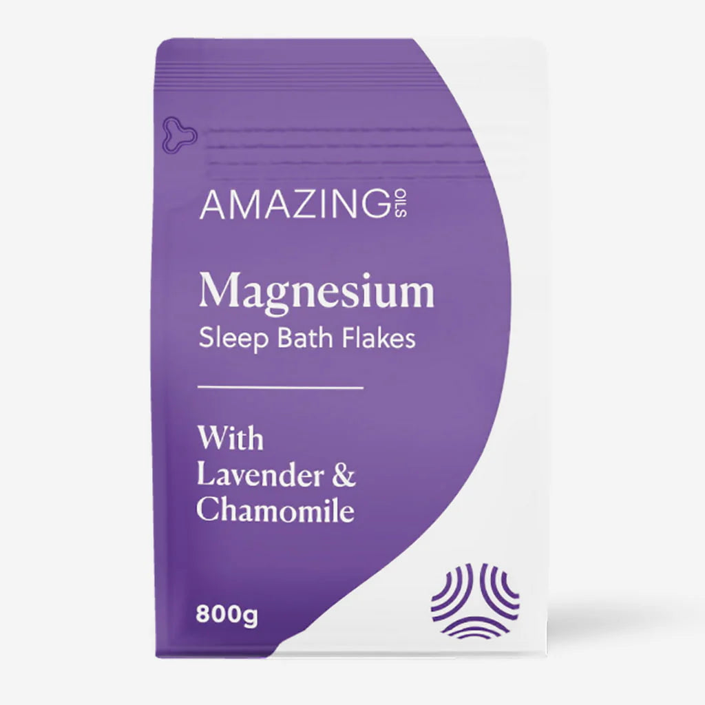 Purple package of Amazing Magnesium Sleep Bath Flakes with Lavender & Chamomile on a white background. Magnesium bath flakes for sleep—relax muscles, ease stress, and support deep sleep through a calming evening soak. Amazing Oils Australian stockist. Geelong based. Shop now!