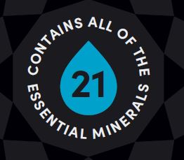 Hexagonal badge with blue droplet icon and text 'Contains all of the essential minerals 21' on a black background