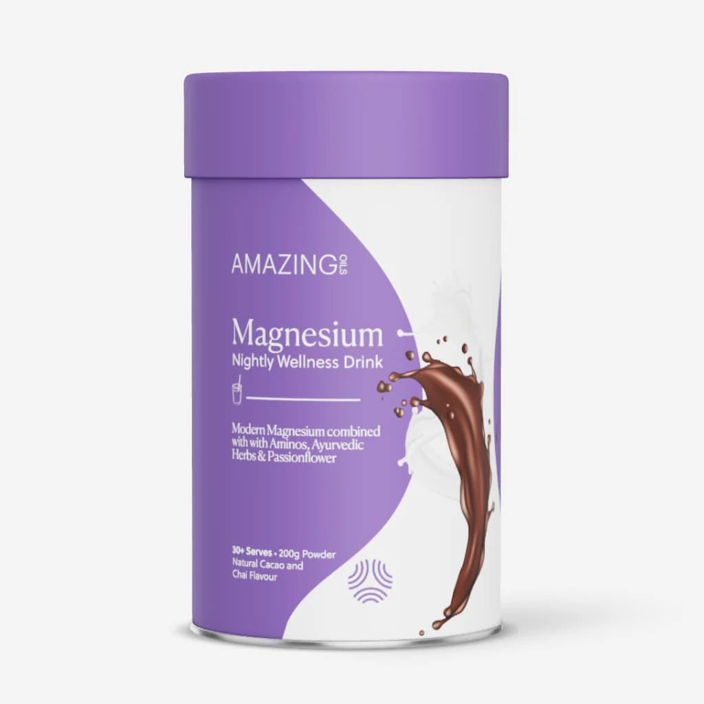 Purple and white container of Amazing Magnesium Nightly Wellness Drink on a white background. Cacao‑chai bedtime drink with magnesium, ashwagandha, and calming botanicals for stress relief and natural sleep support. Amazing Oils Australian stockist. Geelong based. Shop now!