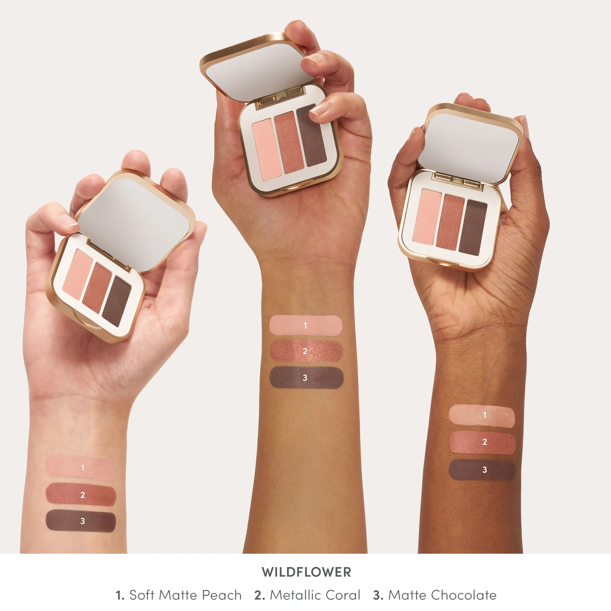 Swatches on different skin tone with Jane Iredale's PurePressed® Eye Shadow Triple shade Wildflower - soft matte peach, metallic coral, matte chocolate. Jane Iredale Australian Stockist. Geelong based. Shop now.