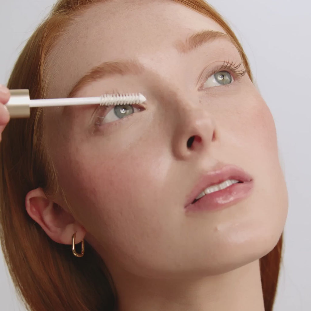 How to apply Jane Iredale's PureLash® Lash Extender & Conditioner. Start at the base of the lashes and gently move up to the tips until covered.