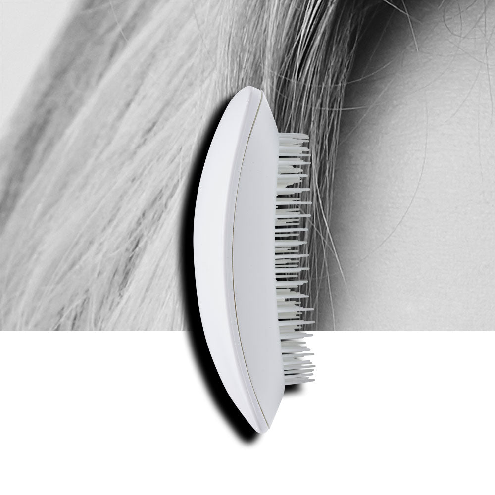 Use Massage Brush to help spread Secret Tonic Lotion evenly over scalp, gently working the tonic into the follicles promoting thicker hair.